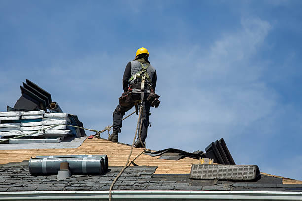 Professional Roof Replacement technician working in Votaw, TX